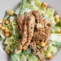 Chicken Caesar Salad · Grilled or blackened chicken breast, fresh romaine lettuce tossed with a creamy Caesar dress...