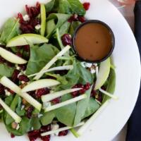 Royal Spinach Salad · Fresh baby spinach tossed with sliced green apples, bleu cheese crumbles, dried cranberries ...