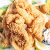 Crispy-Fried Fish Platter · Crispy-fried Gulf fish strips piled high.