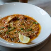 Crawfish & Crabmeat Ravioli · Jumbo ravioli filled with lobster, shrimp, spinach & ricotta, topped with creamy Louisiana c...