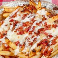 Bacon Cheese French Fries · Our crispy golden brown French Fries topped with Bacon and melted Mozzarella Cheese.  Served...