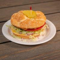 Cheeseburger · 3 Oz. Beef patties, lettuce, tomato, onions and mustard,