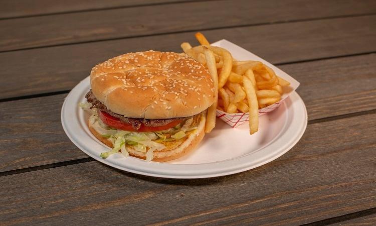 Big Bite · Double hamburger.. 3 Oz. Beef patties, lettuce, tomato, onions and mustard, with fries.