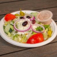 Greek Salad · Feta cheese, olives, cucumber, tomato, onions and peppers.