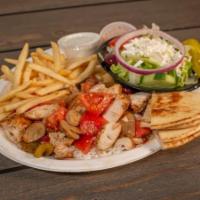 Greek Chic Plate · Over rice with mushrooms, onions, peppers and tomato. Fries, Greek salad,tzatziki and pita b...