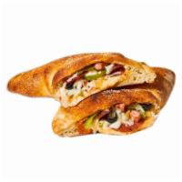 Italian Calzone · Pepperoni and Italian Sausage
All Calzones are a half folded pizza, with Ricotta cheese, Moz...