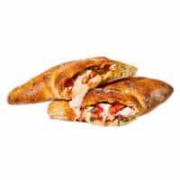Hawaiian Calzone · Ham and pineapple.
All Calzones are a half folded pizza, with Ricotta cheese, Mozzarella che...