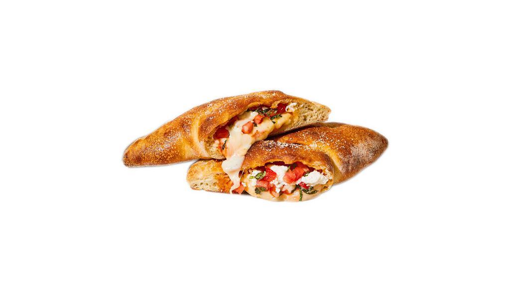 Hawaiian Calzone · Ham and pineapple.
All Calzones are a half folded pizza, with Ricotta cheese, Mozzarella cheese