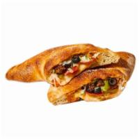 Supreme Calzone · Pepperoni, sausage, onion, mushroom and green pepper.
All Calzones are a half folded pizza, ...