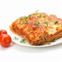 Meat Lasagna · Beef, tomato and mozzarella over layers of tender Pasta, topped with Marinara sauce and bake...