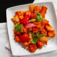 Chili Paneer · Fresh Paneer and peppers tossed with sauces.
