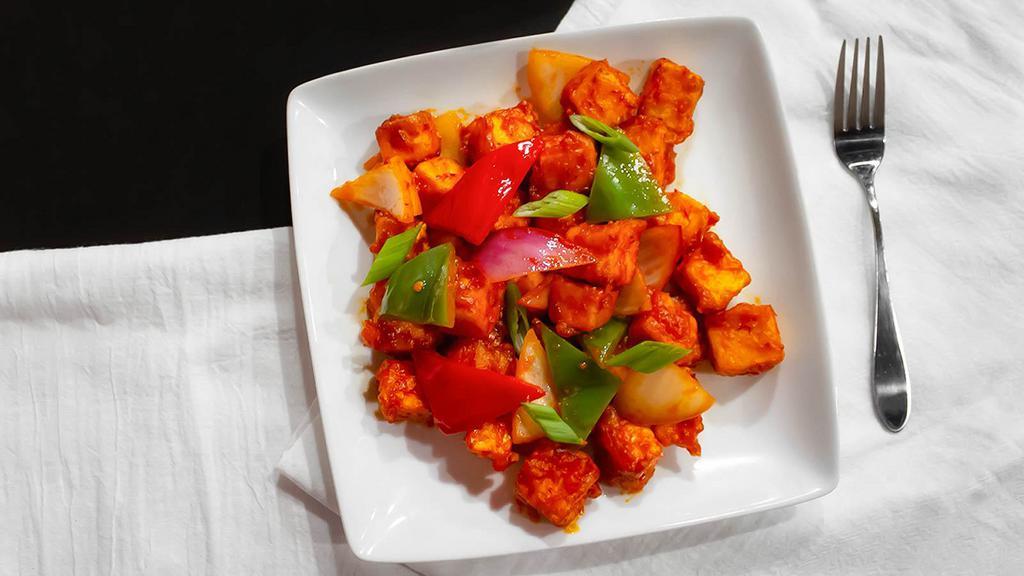 Chili Paneer · Fresh Paneer and peppers tossed with sauces.