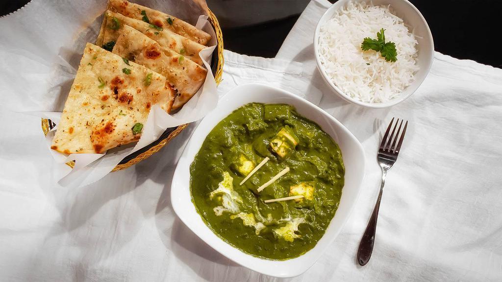 Palak Paneer Curry · Fresh paneer and spinach cooked with butter and spices.