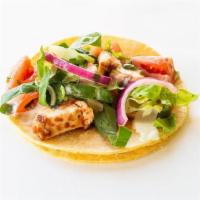 Honey Lime Taco · Grilled mesquite chicken, Honey Lime sauce, romaine and fiesta tomatoes.