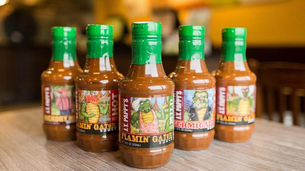 Bottle Of Jt Pappy'S Gator Sauce · A hint of sweet 'n tangy