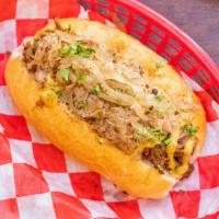 The Drunk Pig Sandwich · Slow-roasted pork, marinated in dark beer with spice & herb rub, topped with sauerkraut, car...