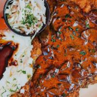 Hunter Schnitzel Platter (Chicken) · Fried breaded chicken breast in a mushroom and onion sauce served with mashed potatoes & car...