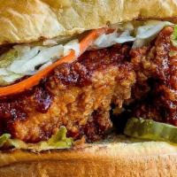Nashville Hot Chicken Samwich · NEW! Spicy Fried Chicken Thigh on a Brioche bun with pickles, slaw, and Nashville Hot Sauce....