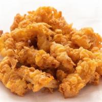 Clam Strips · 6oz portion of fresh clam strips served with our house recipe tartar sauce.