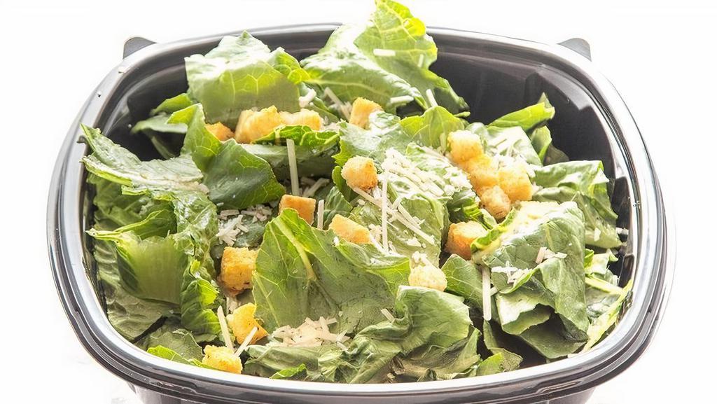 Caesar Salad · Crisp Salad greens, carrots, diced tomato, shredded Cheddar Cheese topped with your choice of protein.