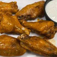 Chicken Wings · Cooked wing of a chicken coated in sauce or seasoning. comes with a choice of sauce.