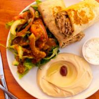 Chicken Shawarma Meal · Includes includes fountain drink, choice of fries and traditional sauce or hummus, salad, pi...