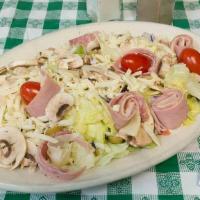 Antipasto Salad · Larger house salad with rolled salami, ham, and provolone cheese.