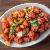Curried Baby Corn · Baby corn battered and wok tossed with fine chopped garlic in our signature manchurian sauce