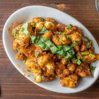 Cauliflower & Potato Curry · Traditional Indian dish made with cauliflower, potato, cooked with vibrant flavors of fresh ...