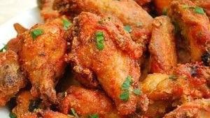 Butter Chicken · Chicken pieces roasted in a clay oven and tossed in a creamy tomato sauce