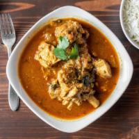 Chicken Curry · Chicken chunks sautéed with fresh garlic, ginger, and tomatoes