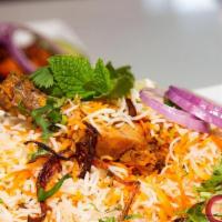 Special Boneless Chicken Biryani · Boneless chicken marinated with herbs, Indian spices and cooked with long grain basmati rice...