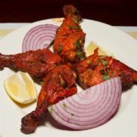 Tandoori Chicken · Roasted with yogurt and spices.
