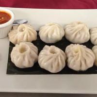 Veg Mo:Mo Classic · Vegetarian. Steamed dumplings stuffed with finely chopped veggies, cottage cheese,special he...