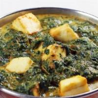 Palak Paneer · Vegetarian. Gluten free. Cottage cheese/Paneer cubes cooked with spinach in creamy sauce.