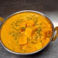 Mutar Paneer · Vegetarian. Gluten free. Cottage cheese and green peas cooked in onion & tomato sauce.
