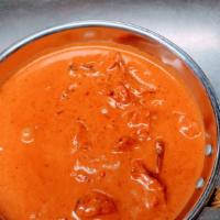 Butter Chicken · Gluten free. Oven-roasted chicken cooked with herbs and spices in a rich creamy tomato onion...