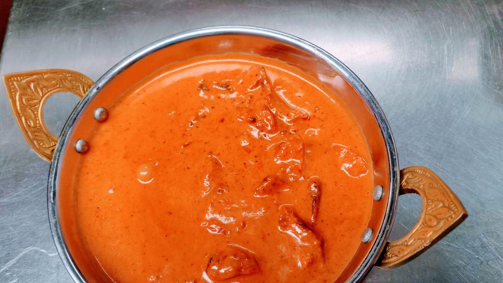 Butter Chicken · Gluten free. Oven-roasted chicken cooked with herbs and spices in a rich creamy tomato onion sauce.
