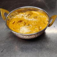 Lamb Korma · Cubes of lamb marinated in a creamy base, sauteed with onions and coriander.