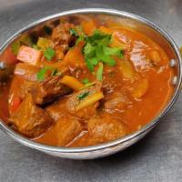 Lamb Kadai · Gluten free. Lamb cooked with onions, tomatoes and green bell peppers.