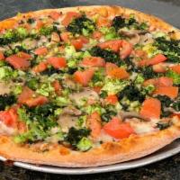 Veggie Pizza · Roma tomatoes, spinach broccoli, mushrooms, and fresh garlic.
