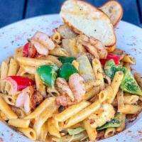 Hawthorne’S Cajun Pasta · Grilled chicken breast, Italian sausage and shrimp tossed with peppers and onions in a cajun...