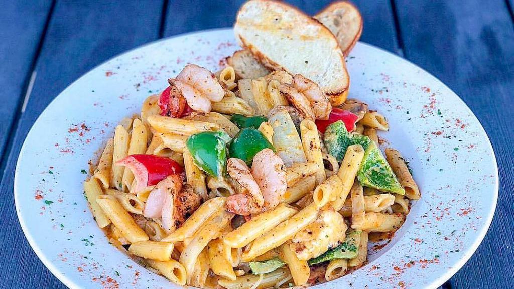 Hawthorne’S Cajun Pasta · Grilled chicken breast, Italian sausage and shrimp tossed with peppers and onions in a cajun cream sauce, served over penne pasta.
