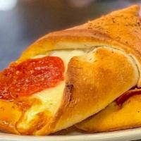 Italian Stromboli · Loaded full of Italian sausage and pepperoni. We wrap the finest ingredients into fresh home...