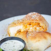 Buffalo Chicken Stromboli · We wrap the finest ingredients into fresh homemade pizza dough, bake it to perfection. Serve...