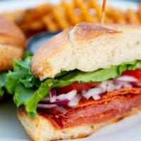 The Godfather Sandwich · Served hot, ham capicola, Genoa salami, pepperoni, provolone cheese, lettuce, tomato, red on...