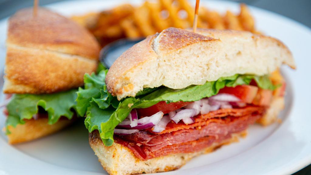 The Godfather Sandwich · Served hot, ham capicola, Genoa salami, pepperoni, provolone cheese, lettuce, tomato, red onion and Italian dressing.