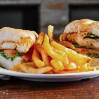 Catfish Poboy · All PoBoys served dressed with remoulade sauce, lettuce, tomato and pickles with seasoned fr...