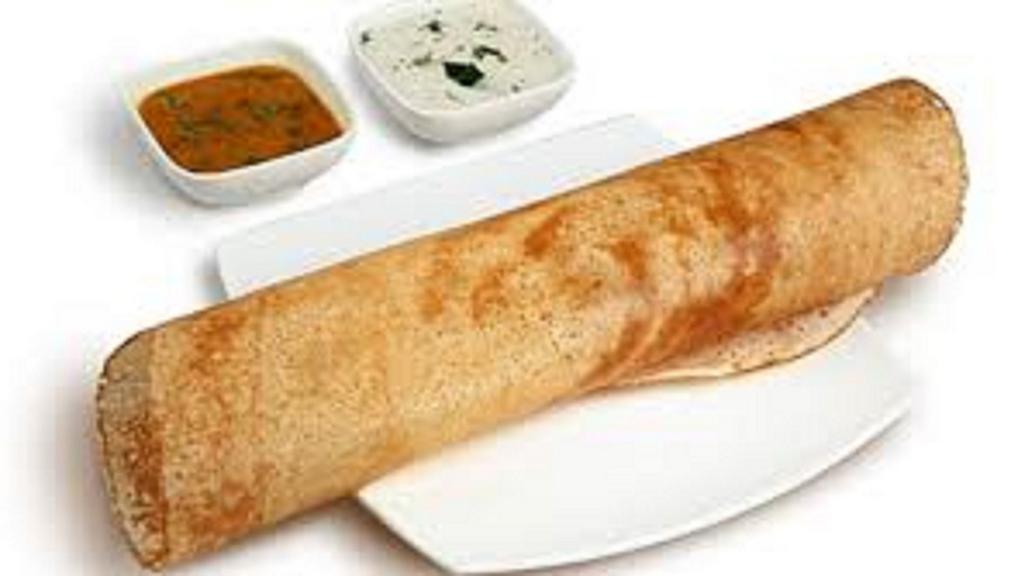 Onion Dosa · Crepe made with Rice and Onion Topping, Served with Chutney and Sambar (Lentil Soup)