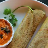 Pesarattu · A Thin Crepe made with Green Lentils. Served with Chutney and Sambar(Lentil Soup)